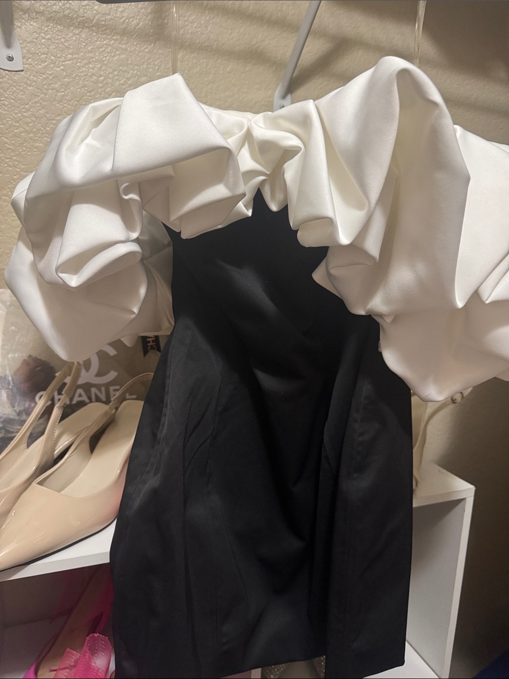 Off-Shoulder Black Dress with Dramatic White Ruffle